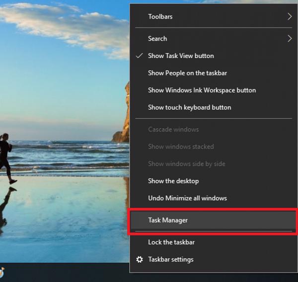 Chuột phải vào Taskbar -> Task Manager