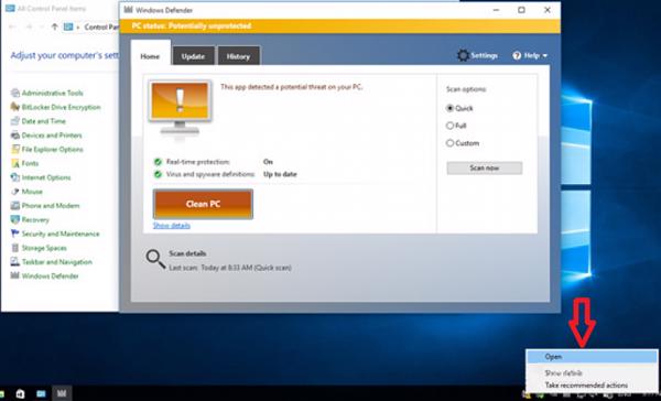 Control Panel -> sau đó chọn vào Windows Defender -> nhấn chuột phải vào biểu tượng icon Windows Defender -> Open