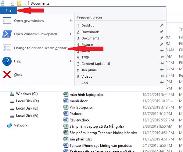 Chọn vào tab File -> sau đó Change folder and search options
