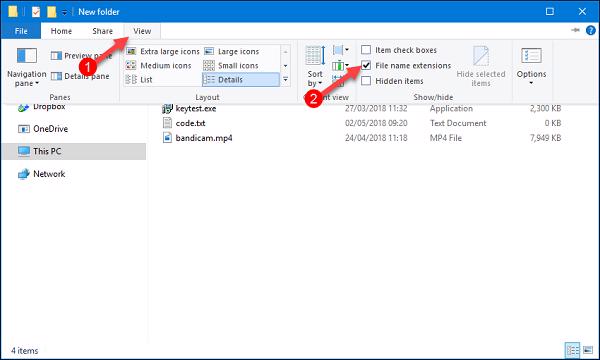 Chọn vào tab View và tích chọn ô File name extensions