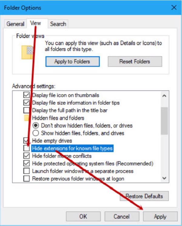 Chọn vào tab View, rồi sau đó bỏ tích chọn ở ô Hide extensions for know file types và tiếp đến nhấn vào OK