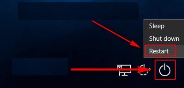 Nhấn phím Shift trên bàn phím và nhấn vào Restart